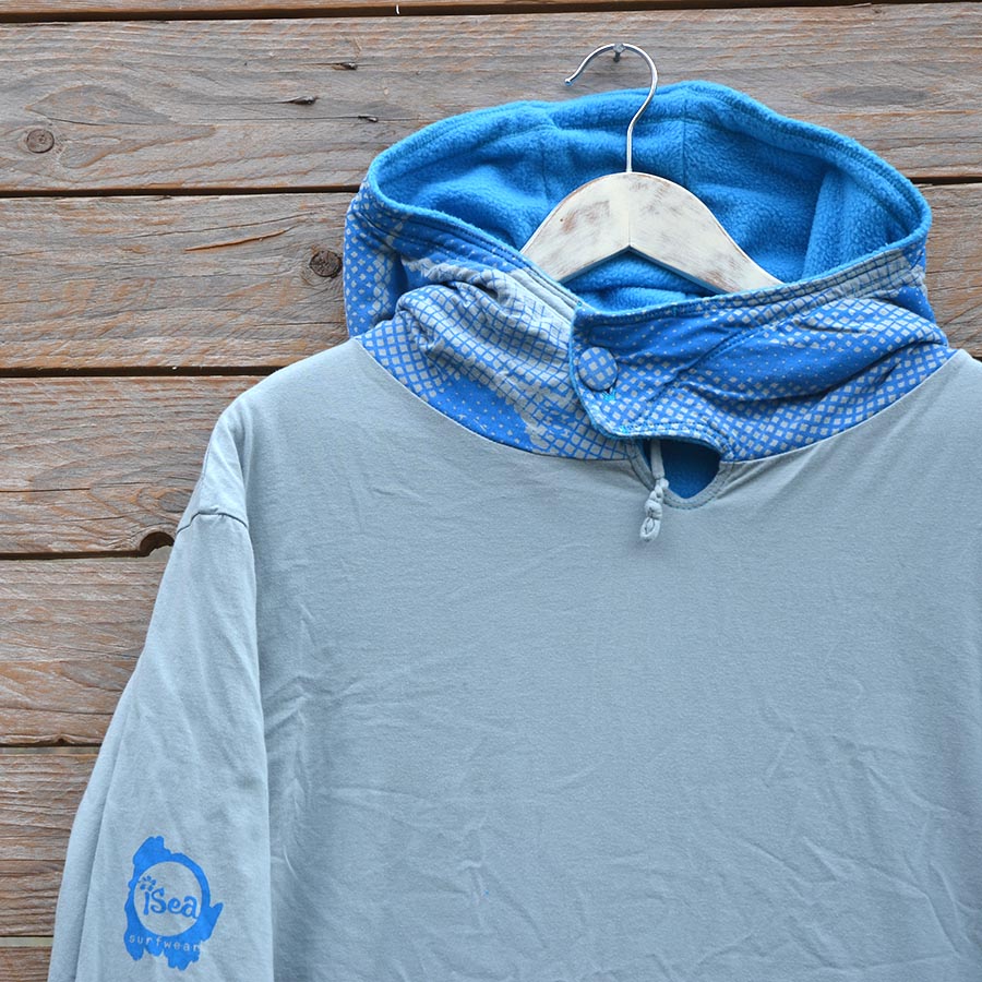 Close up Men's reversible hoody, size large in turquoise and grey