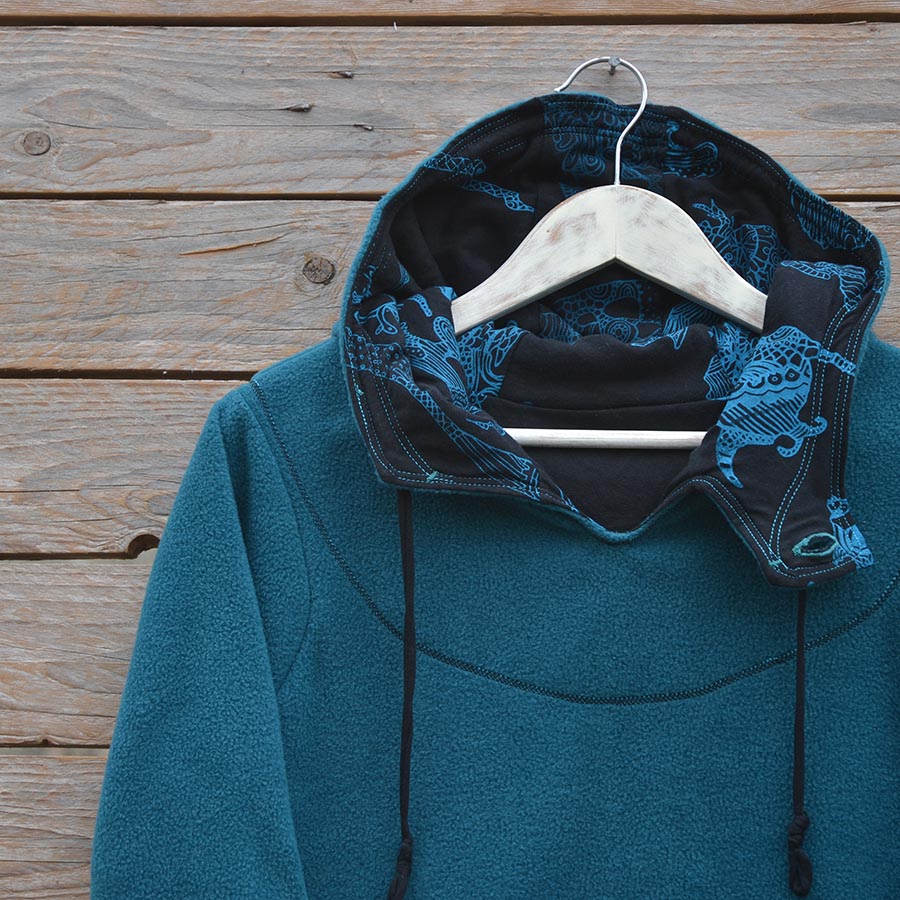 Close up Women's hoody dress in teal and black, size 10