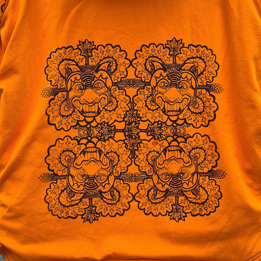 orange closeup Kid's reversible hoody black and orange